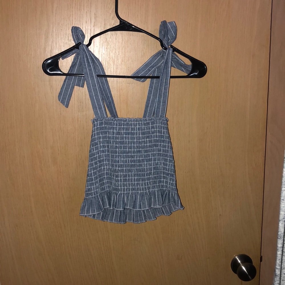 Tank top with cute tie shoulders! Only worn once!